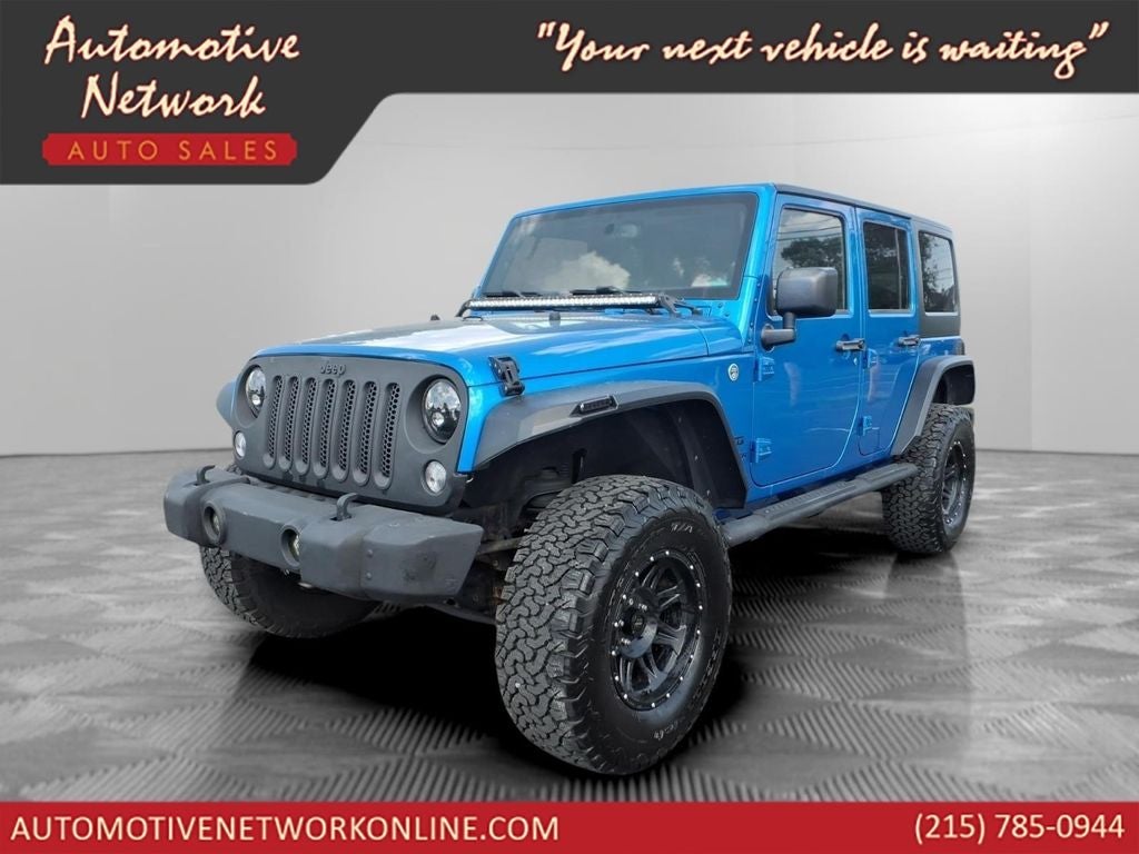 2015 Jeep Wrangler Unlimited Sport in Hydro Blue Pearl Coat — front three-quarter view
