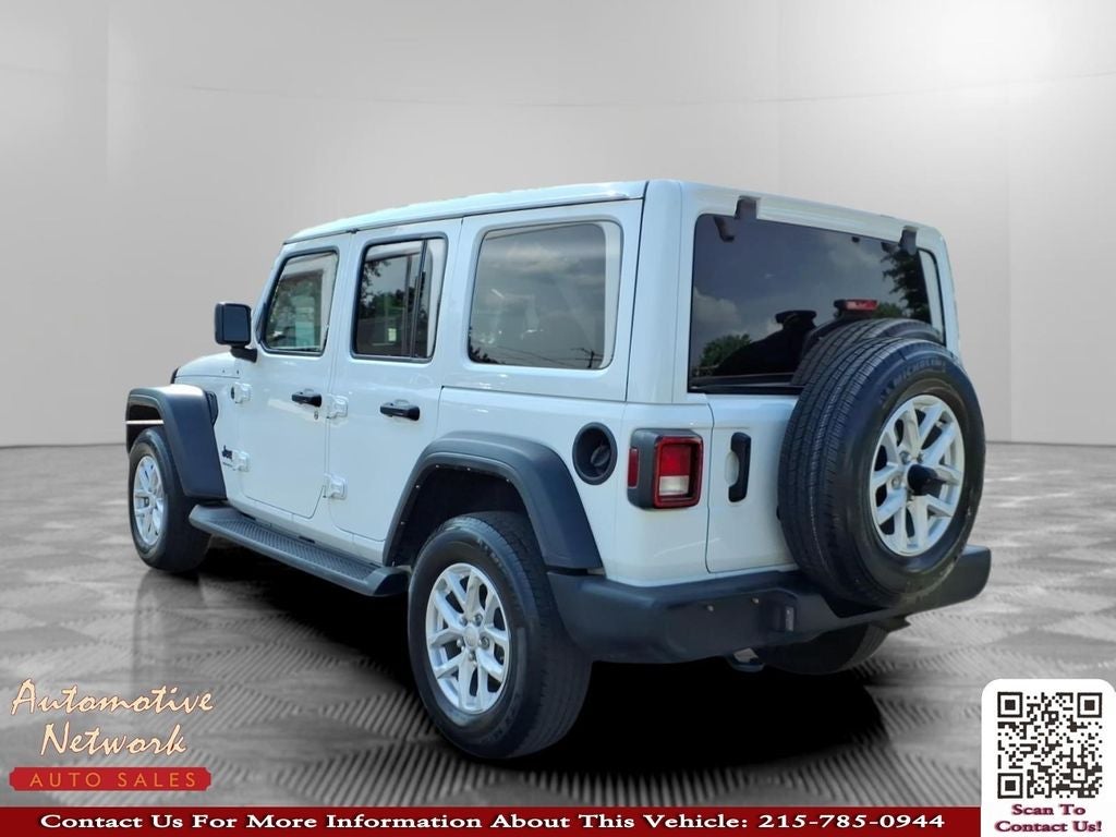 2023 Jeep Wrangler — rear three-quarter view