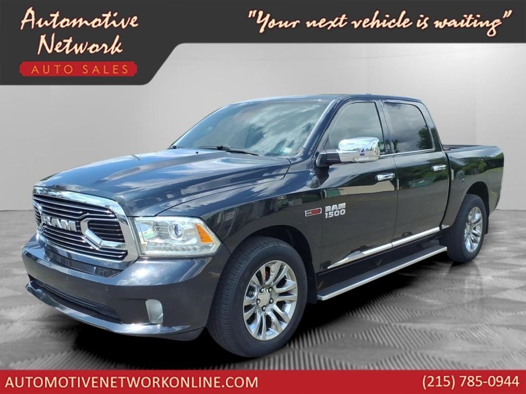 2016 RAM 1500 Laramie Longhorn in Pearl White — front three-quarter view