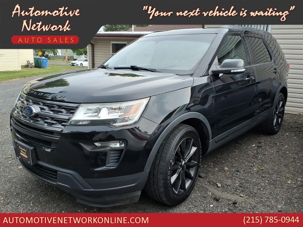 2018 Ford Explorer XLT in Shadow Black — front three-quarter view