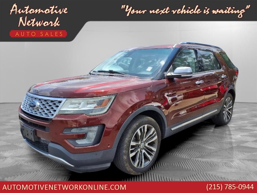 2016 Ford Explorer Platinum in Bronze — front three-quarter view