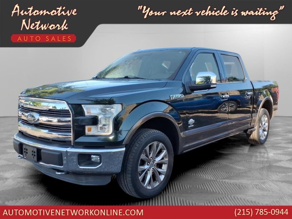 2015 Ford F-150 King Ranch in Dark Green — front three-quarter view