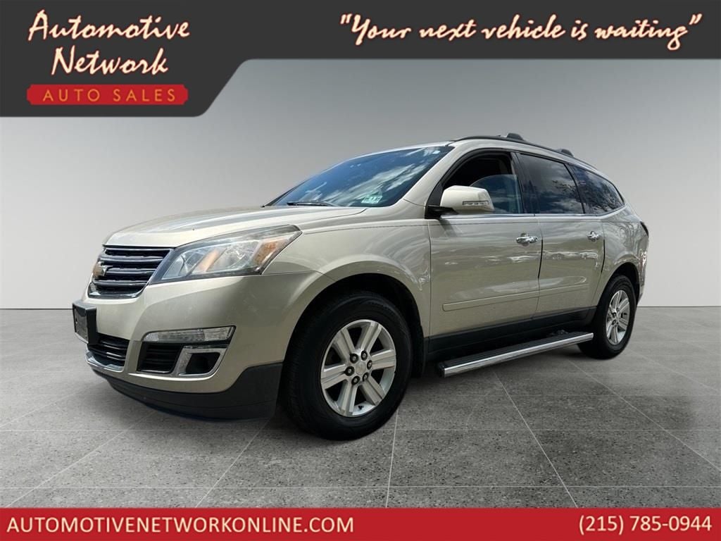 2014 Chevrolet Traverse LT 1LT in Champagne Silver Metallic — front three-quarter view
