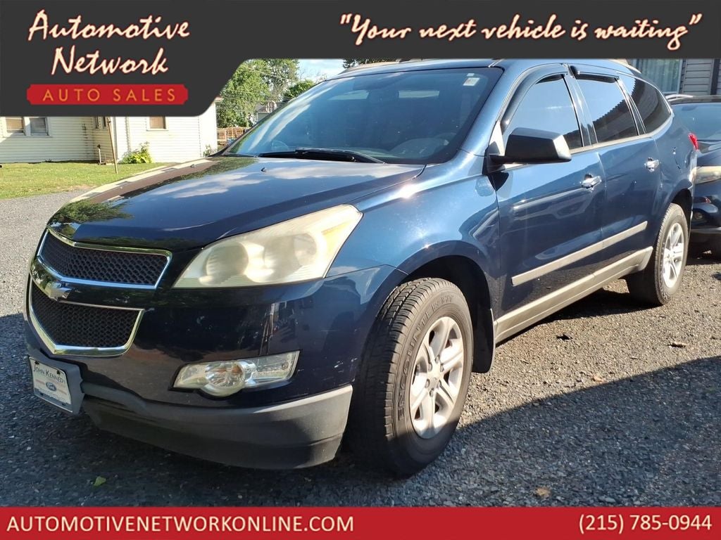 2010 Chevrolet Traverse LS in Dark Blue Metallic — front three-quarter view