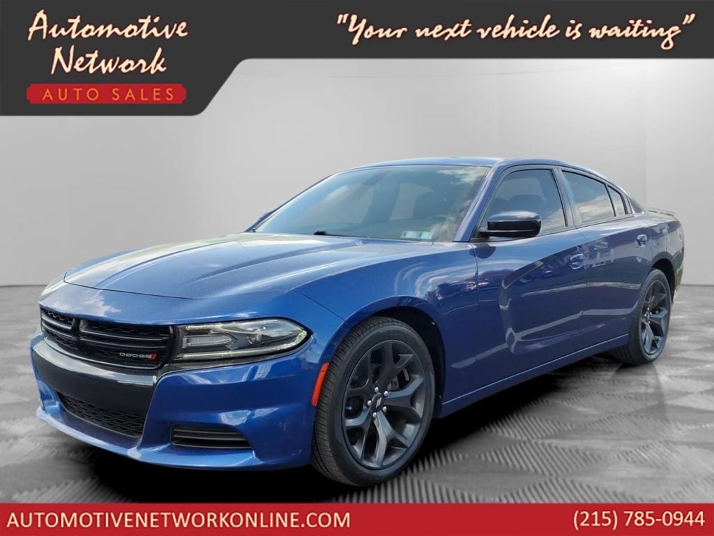 2020 Dodge Charger SXT in Indigo Blue — front three-quarter view