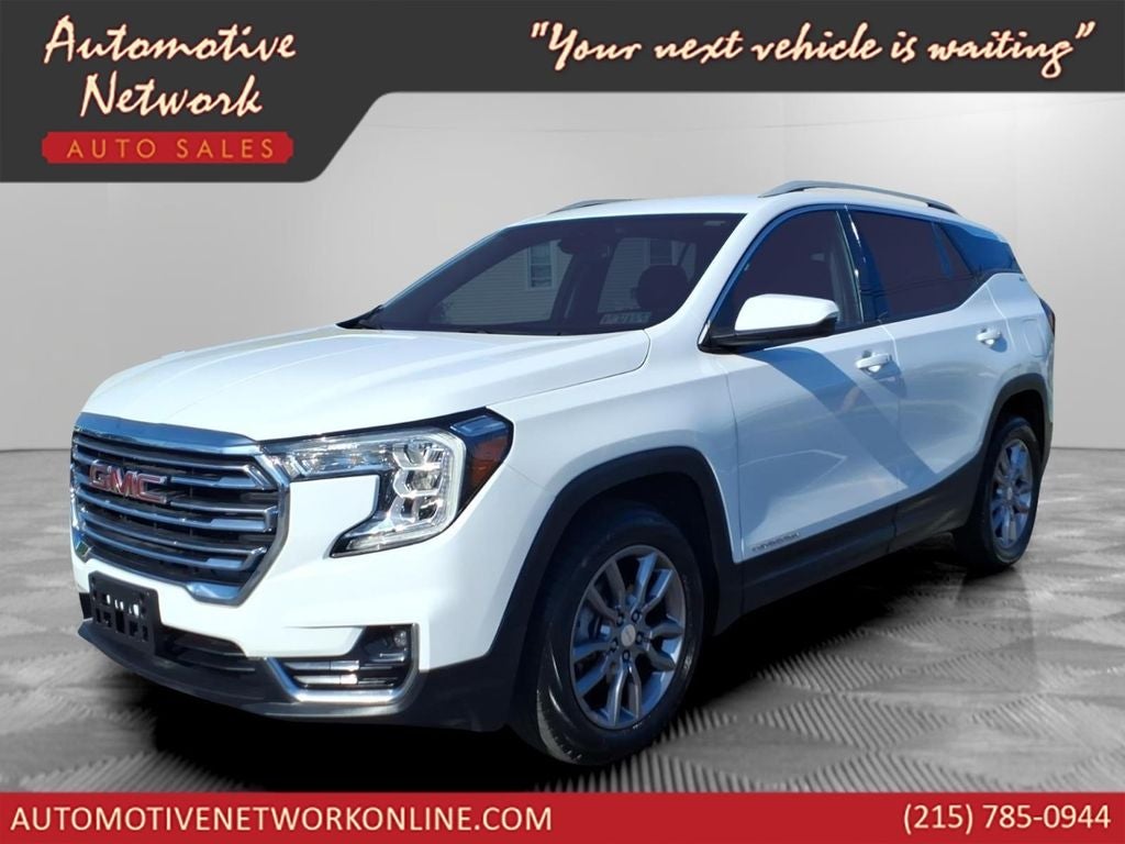 2024 GMC Terrain SLT in Summit White — front three-quarter view
