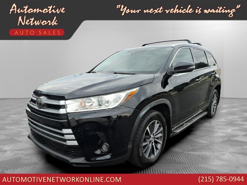 2017 Toyota Highlander XLE in Midnight Black Metallic — front three-quarter view