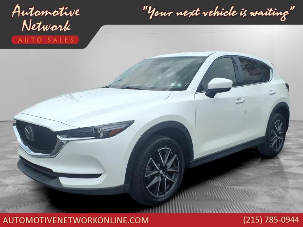 2017 Mazda Mazda CX-5 Grand Touring in Snowflake White Pearl Mica — front three-quarter view