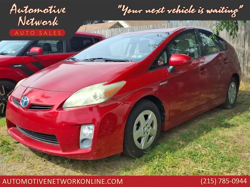 2011 Toyota Prius Three in Barcelona Red Metallic — front three-quarter view