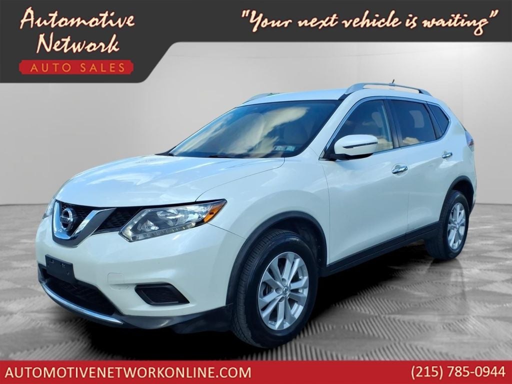 2016 Nissan Rogue SV in Pearl White — front three-quarter view