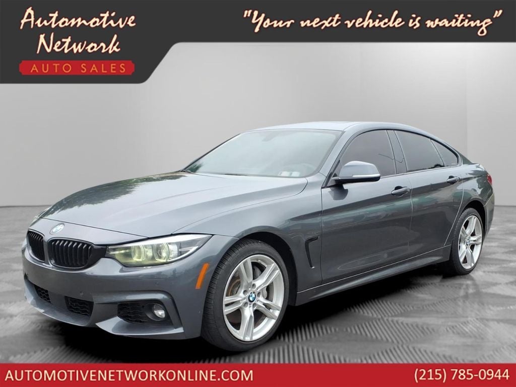 2018 BMW 4 Series 430i xDrive Gran Coupe in Mineral Gray Metallic — front three-quarter view